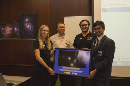 Group photo: ICRAR students Jacinta Delhaize & Mehmet Alpaslan, Trinity College teacher Bill Cooper & student Ryan Soares (contest winner).