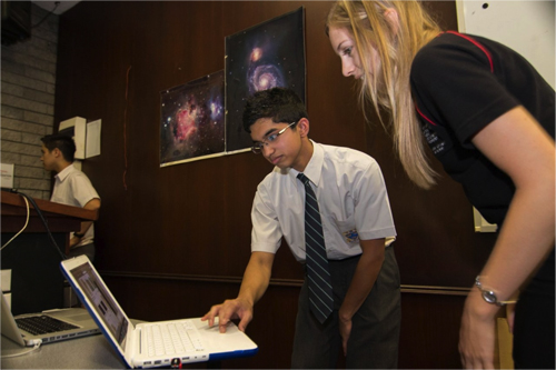 Photo of Ryan Soares (contest winner, Trinity College student) with Jacinta Delhaize (International Centre for Radio Astronomy (ICRAR) Research PhD student).