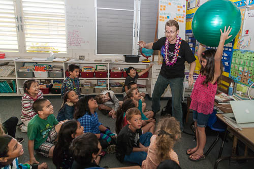 Picture of Gemini Astronomer Richard McDermid interacting engaging students in understanding the scale of our solar system.