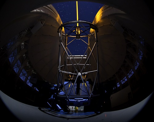 Picture of the Gemini South telescope during laser operations.