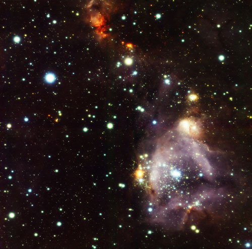 Gemini South GeMS/GSAOI near-infrared image of the N159W field in the Large Magellanic Cloud. The image spans 1.5 arcminutes across, resolves stars to about 0.09 arcseconds, and is a composite of three filters (J, H, and Ks). Integration (exposure) time for each filter was 25 minutes. Color composite image by Travis Rector, University of Alaska Anchorage.