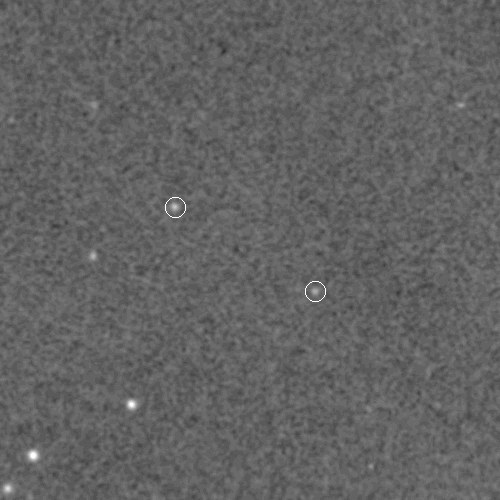 This sequence of three images shows the same region of sky over time, captured by different telescopes. The faint objects show a slight movement relative to the background stars, which helped identify them as a binary system.