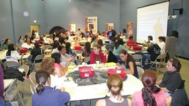 Picture of Journey Through the Universe teachers engaged in group activities.