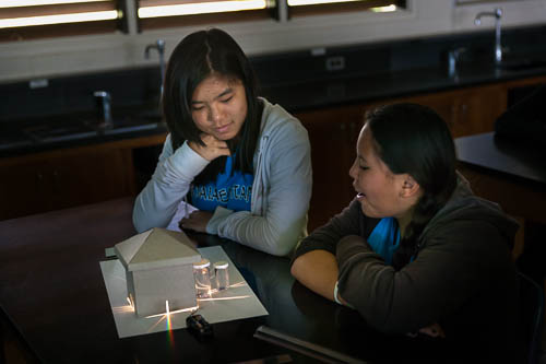 Picture of Students at Waiakea Intermediate School experiment with light using a “Light House”