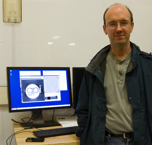 Picture of Principal Investigator Bruce Macintosh with confirmation of the first successful GPI adaptive optics system test at Gemini South