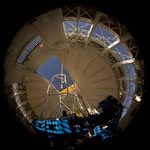 Picture of the Gemini North laser guide from inside the dome.