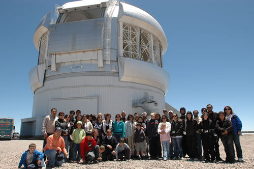 Picture of Gemini South staff family tour participants assemble outside of Gemini South